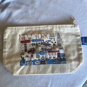 New without tags.  Julia Gash New York canvas zipper pouch.